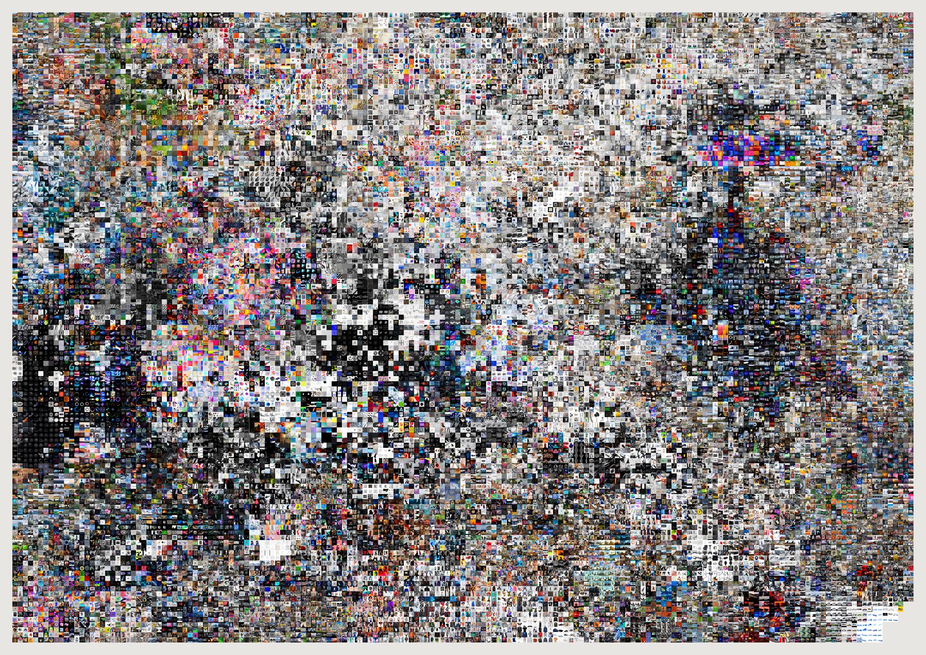 A dense grid of twenty-six thousand small images arranged so that visually similar ones sit together.